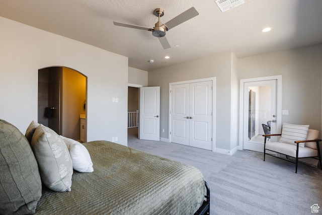 266 N 2020 W # 74, Hurricane, UT 84737 - bedroom with arched walkways, light carpet, recessed lighting, a closet, and baseboards