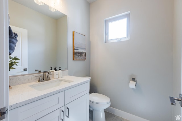266 N 2020 W # 74, Hurricane, UT 84737 - bathroom with toilet, vanity, and baseboards