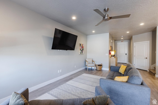 266 N 2020 W # 74, Hurricane, UT 84737 - living room featuring ceiling fan, baseboards, light wood-type flooring, recessed lighting, and a textured ceiling