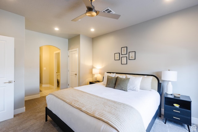 266 N 2020 W # 74, Hurricane, UT 84737 - bedroom featuring arched walkways, light colored carpet, baseboards, a ceiling fan, and recessed lighting