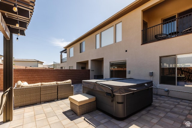 266 N 2020 W # 74, Hurricane, UT 84737 - view of patio featuring a hot tub and an outdoor living space