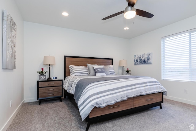 356 W Oregon Trail Dr Unit 100, Garden City, UT 84028 - bedroom with light colored carpet, multiple windows, baseboards, and recessed lighting