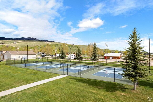 356 W Oregon Trail Dr Unit 100, Garden City, UT 84028 - view of tennis court featuring a mountain view