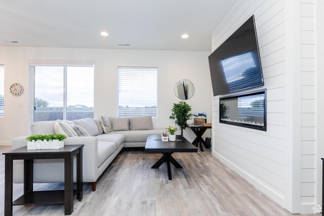356 W Oregon Trail Dr Unit 100, Garden City, UT 84028 - living area featuring baseboards, light wood-style floors, and recessed lighting