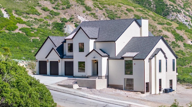 3851 W Box Elder Cir, Alpine, UT 84004 - view of front of home featuring driveway, stucco siding, and roof with shingles