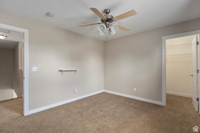 1754 E Cedar Trails Way, Eagle Mountain, UT 84005 - carpeted spare room featuring a ceiling fan, baseboards, and a smoke detector
