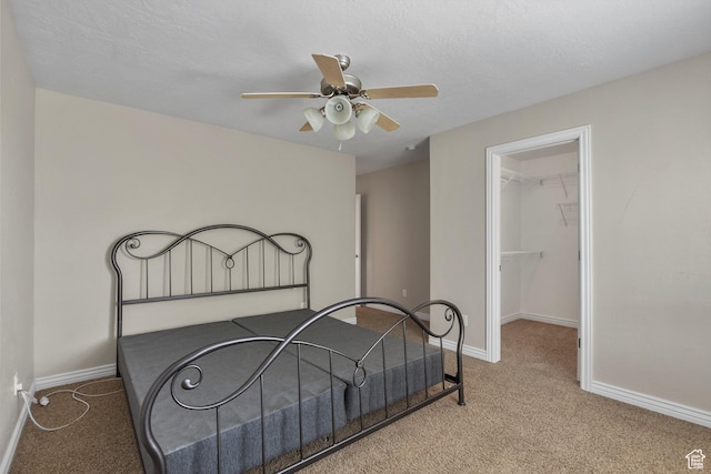 1754 E Cedar Trails Way, Eagle Mountain, UT 84005 - bedroom with carpet flooring, baseboards, a spacious closet, a closet, and ceiling fan