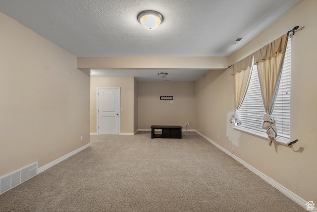 1754 E Cedar Trails Way, Eagle Mountain, UT 84005 - carpeted empty room featuring baseboards and a textured ceiling