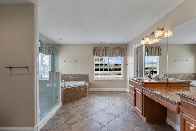 1754 E Cedar Trails Way, Eagle Mountain, UT 84005 - full bathroom with a garden tub, vanity, a stall shower, baseboards, and tile patterned flooring