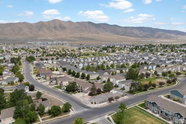 1754 E Cedar Trails Way, Eagle Mountain, UT 84005 - aerial overview of property's location featuring nearby suburban area and a mountain backdrop