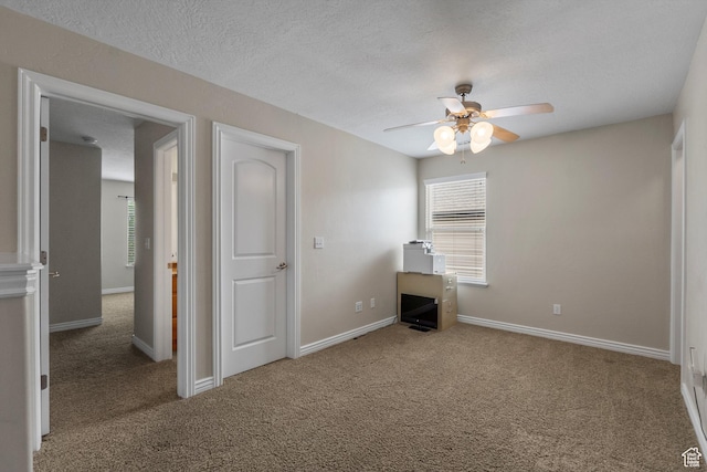 1754 E Cedar Trails Way, Eagle Mountain, UT 84005 - unfurnished bedroom featuring carpet flooring, a textured ceiling, baseboards, and a ceiling fan