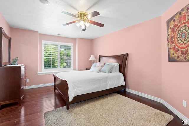 4715 S 1500 E, Ogden, UT 84403 - bedroom featuring dark wood-type flooring, baseboards, and a ceiling fan