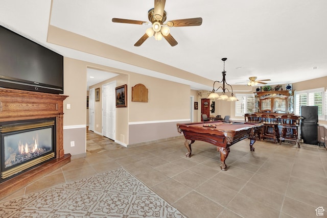 4715 S 1500 E, Ogden, UT 84403 - playroom with billiards table, ceiling fan, a glass covered fireplace, light tile patterned flooring, and baseboards