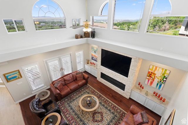 4715 S 1500 E, Ogden, UT 84403 - living area with wood finished floors, a high ceiling, and a ceiling fan