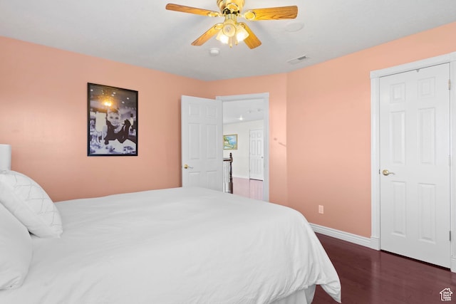 4715 S 1500 E, Ogden, UT 84403 - bedroom with dark wood-style floors, baseboards, and a ceiling fan