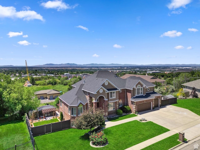 4715 S 1500 E, Ogden, UT 84403 - aerial view of property and surrounding area featuring a mountain backdrop