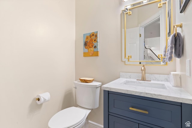 4715 S 1500 E, Ogden, UT 84403 - bathroom with toilet, vanity, and baseboards