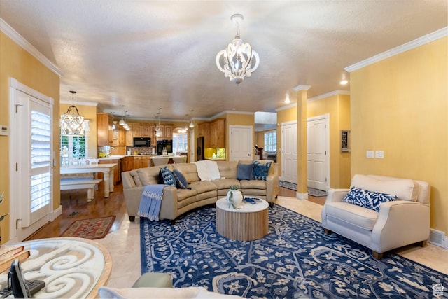 13279 S Berry Ln, Draper, UT 84020 - living room with a chandelier, crown molding, decorative columns, a textured ceiling, and baseboards