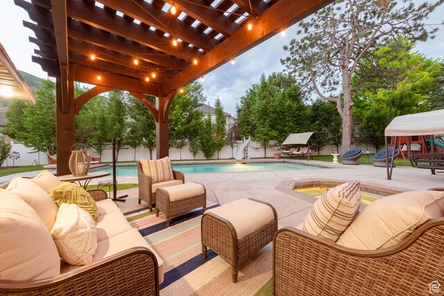 13279 S Berry Ln, Draper, UT 84020 - fenced backyard with an outdoor hangout area, a pergola, and a patio area