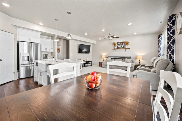 4488 S Haven Creek Rd W Unit 25D, West Haven, UT 84401 - dining room with recessed lighting, a ceiling fan, dark wood-style flooring, and a textured ceiling