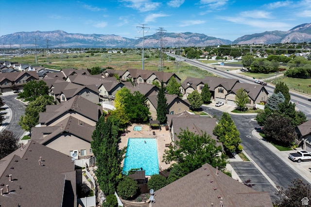 4488 S Haven Creek Rd W Unit 25D, West Haven, UT 84401 - aerial view of residential area featuring a mountain backdrop and a pool