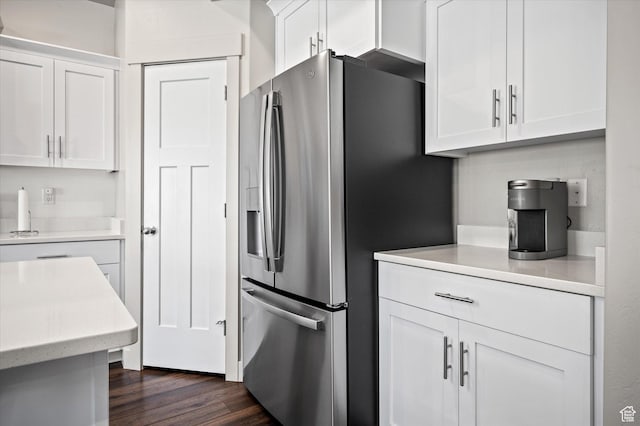 4488 S Haven Creek Rd W Unit 25D, West Haven, UT 84401 - kitchen with stainless steel fridge, white cabinetry, light countertops, and dark wood-style flooring