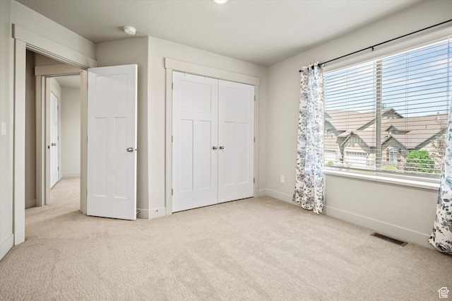 4488 S Haven Creek Rd W Unit 25D, West Haven, UT 84401 - unfurnished bedroom with carpet floors, multiple windows, and baseboards