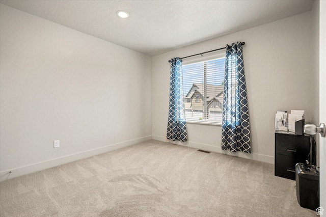 4488 S Haven Creek Rd W Unit 25D, West Haven, UT 84401 - unfurnished room with carpet, baseboards, recessed lighting, and a desk