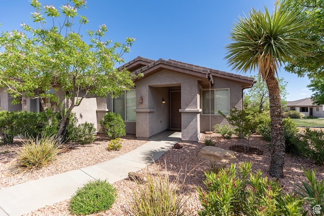 3400 E Hidden Springs Dr, Washington, UT 84780 - ranch-style home with stucco siding and a tiled roof