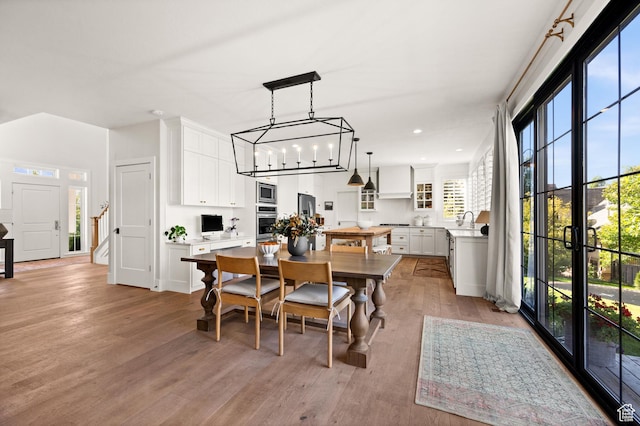 12387 Timberline Dr Unit 53, Highland, UT 84003 - dining room featuring light wood-style floors and recessed lighting