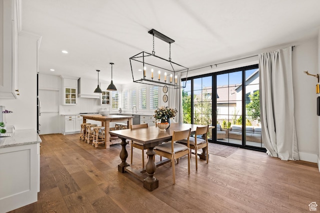 12387 Timberline Dr Unit 53, Highland, UT 84003 - dining room featuring light wood finished floors, a chandelier, and recessed lighting