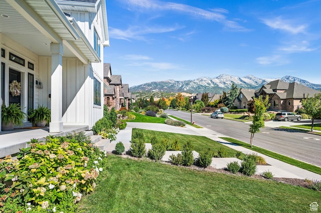 12387 Timberline Dr Unit 53, Highland, UT 84003 - view of grassy yard with a mountain view and a residential view