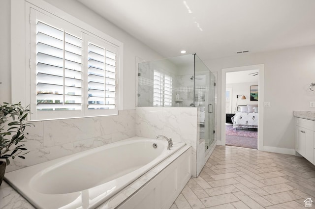 12387 Timberline Dr Unit 53, Highland, UT 84003 - bathroom featuring a bath, a stall shower, vanity, ensuite bath, and recessed lighting