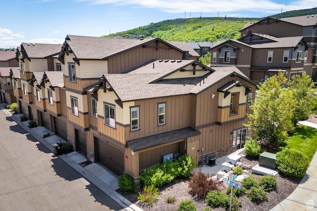 13609 N Hill Climb Ln, Kamas, UT 84036 - view of property featuring a residential view and an attached garage