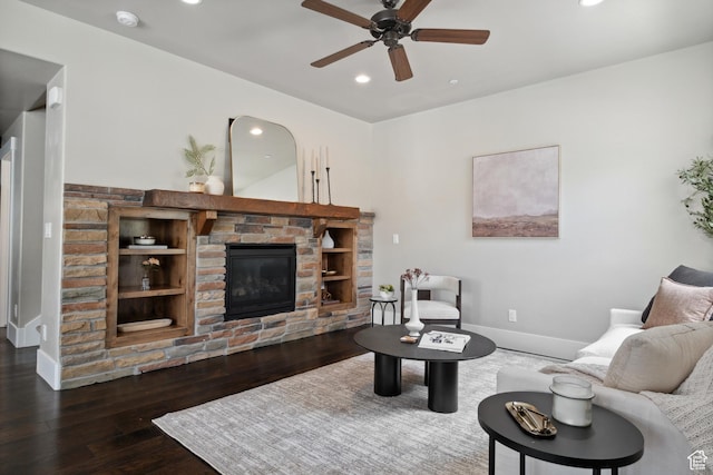 13609 N Hill Climb Ln, Kamas, UT 84036 - living area featuring a ceiling fan, a stone fireplace, recessed lighting, hardwood / wood-style floors, and baseboards