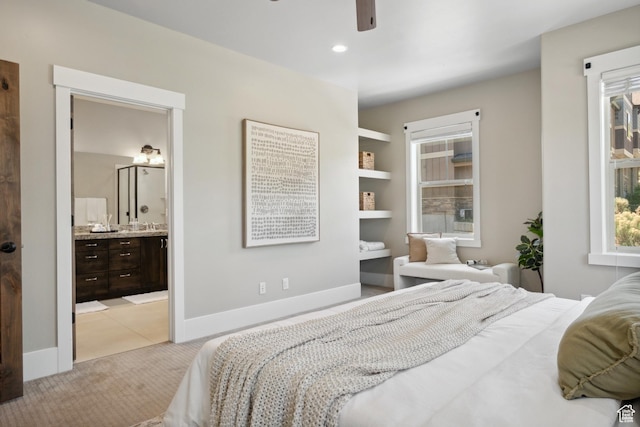 13609 N Hill Climb Ln, Kamas, UT 84036 - bedroom with light carpet, baseboards, ensuite bathroom, a ceiling fan, and recessed lighting