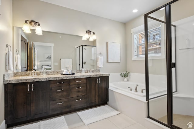 13609 N Hill Climb Ln, Kamas, UT 84036 - bathroom with a stall shower, a garden tub, double vanity, and tile patterned floors