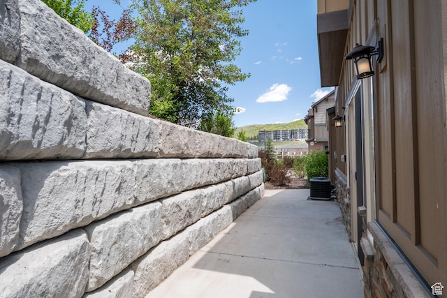 13609 N Hill Climb Ln, Kamas, UT 84036 - view of patio featuring central AC
