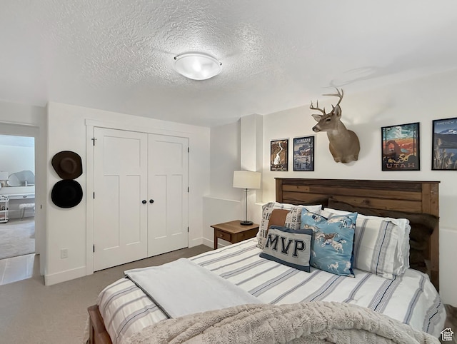 1852 N 4100 W, Plain City, UT 84404 - carpeted bedroom with a closet, baseboards, and a textured ceiling