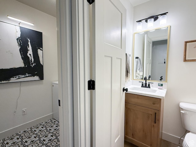 1852 N 4100 W, Plain City, UT 84404 - bathroom with toilet, vanity, and baseboards