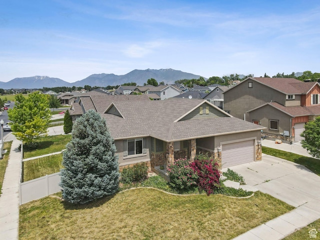 301 E Salem Park Cir, Salem, UT 84653 - view of front of property featuring stone siding, concrete driveway, a garage, roof with shingles, and a residential view
