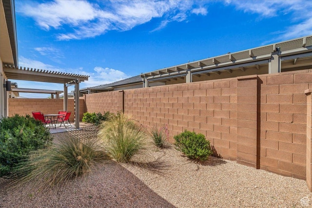 1210 W Ledgerwood Dr, St George, UT 84790 - view of yard featuring a patio area