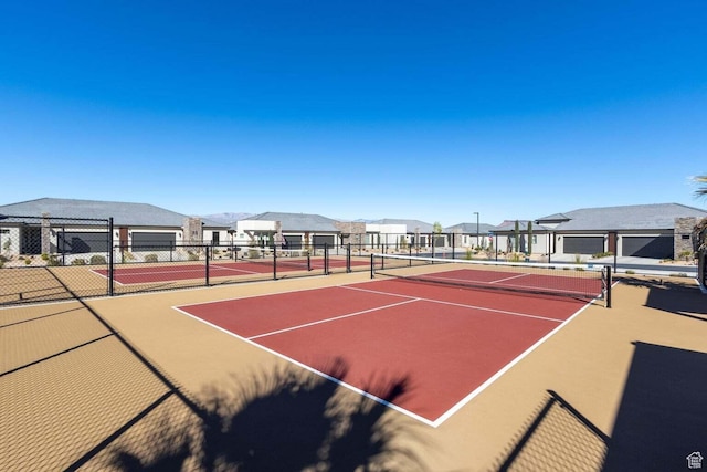 1210 W Ledgerwood Dr, St George, UT 84790 - view of tennis court featuring community basketball court and a residential view