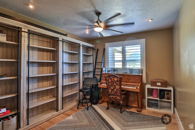 692 E 5020 N, Enoch, UT 84721 - office with ceiling fan, wood finished floors, and a textured ceiling