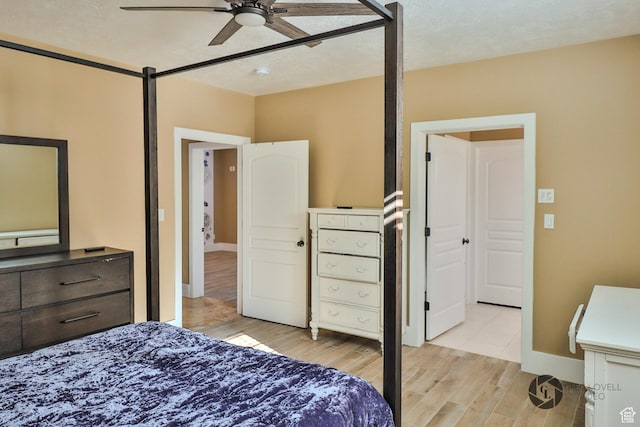 692 E 5020 N, Enoch, UT 84721 - bedroom with light wood-type flooring and ceiling fan