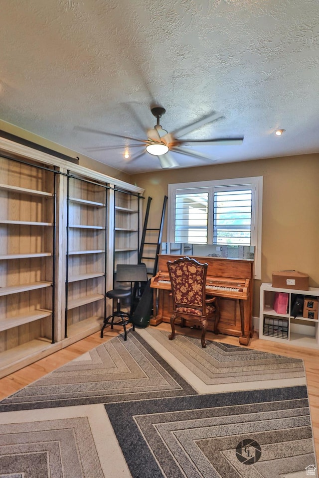 692 E 5020 N, Enoch, UT 84721 - office featuring ceiling fan, a textured ceiling, and wood finished floors