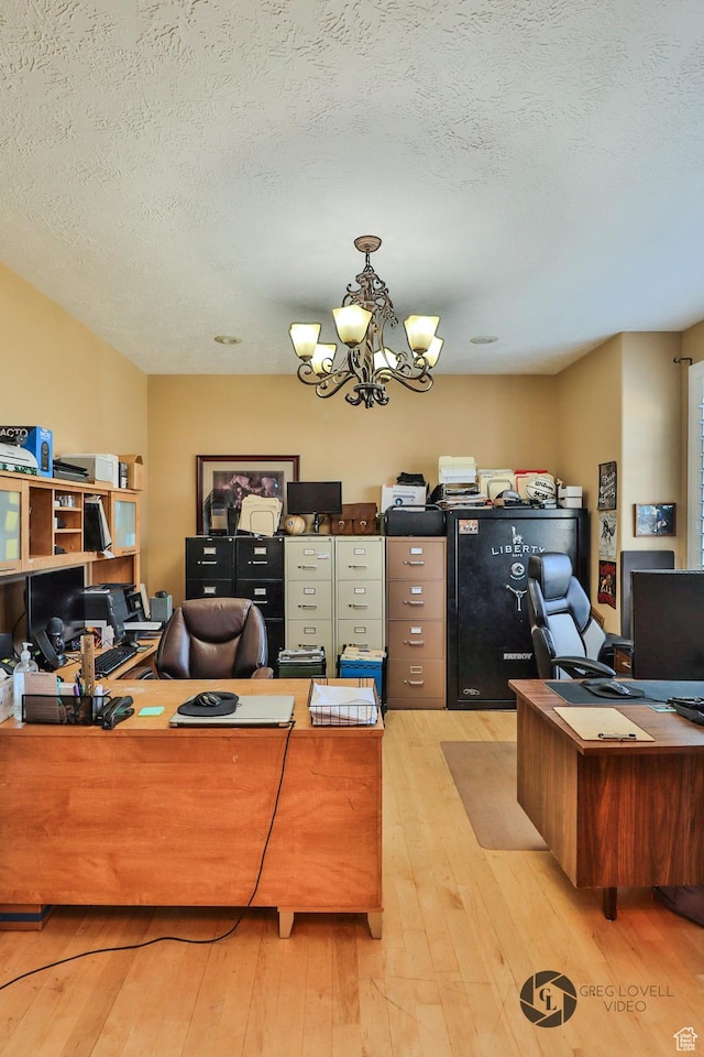 692 E 5020 N, Enoch, UT 84721 - office featuring a chandelier, wood-type flooring, and a textured ceiling