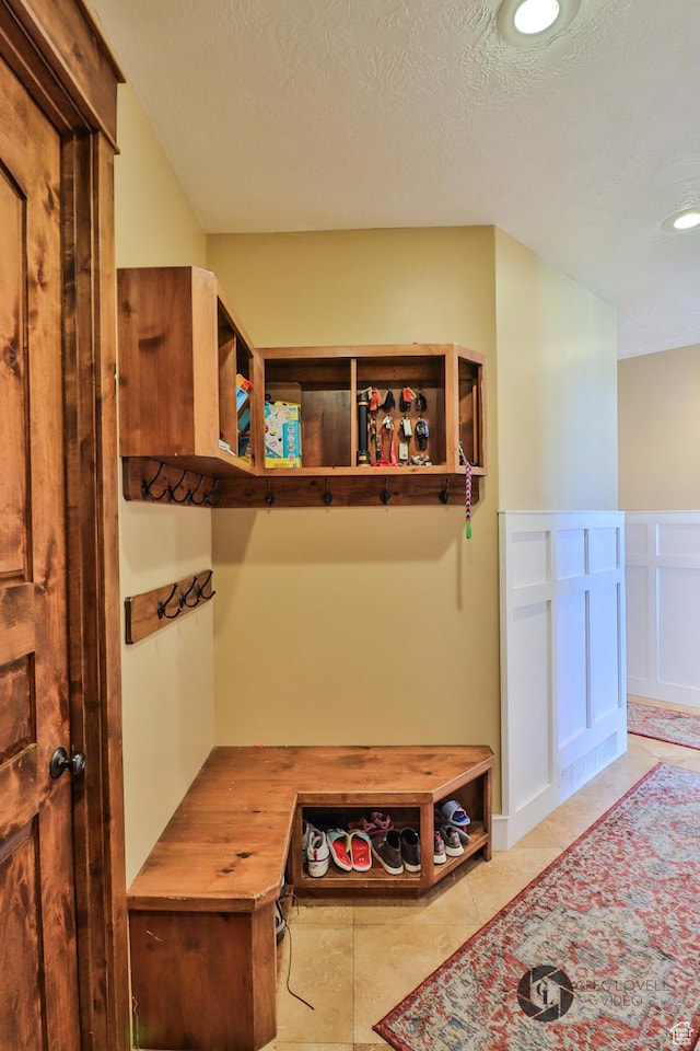 692 E 5020 N, Enoch, UT 84721 - mudroom with light tile patterned flooring, recessed lighting, a textured ceiling, and wainscoting