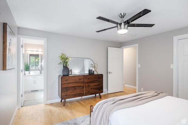 3427 S Fleetwood Dr, Salt Lake City, UT 84109 - bedroom with light wood-type flooring, baseboards, ensuite bathroom, and a ceiling fan