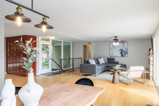 3427 S Fleetwood Dr, Salt Lake City, UT 84109 - living area with wood finished floors, healthy amount of natural light, and a ceiling fan